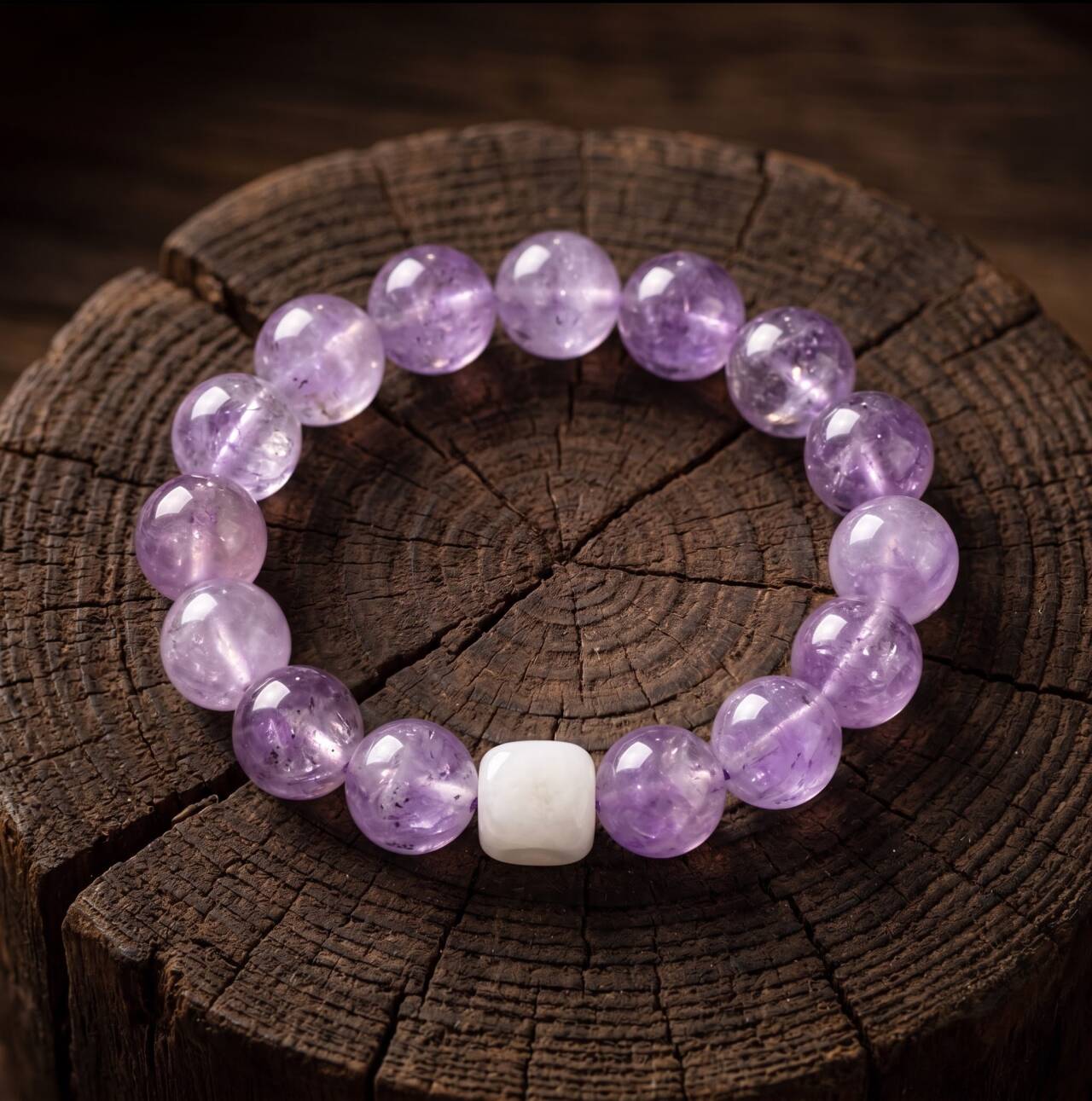 Main product view of a 10mm amethyst bead bracelet