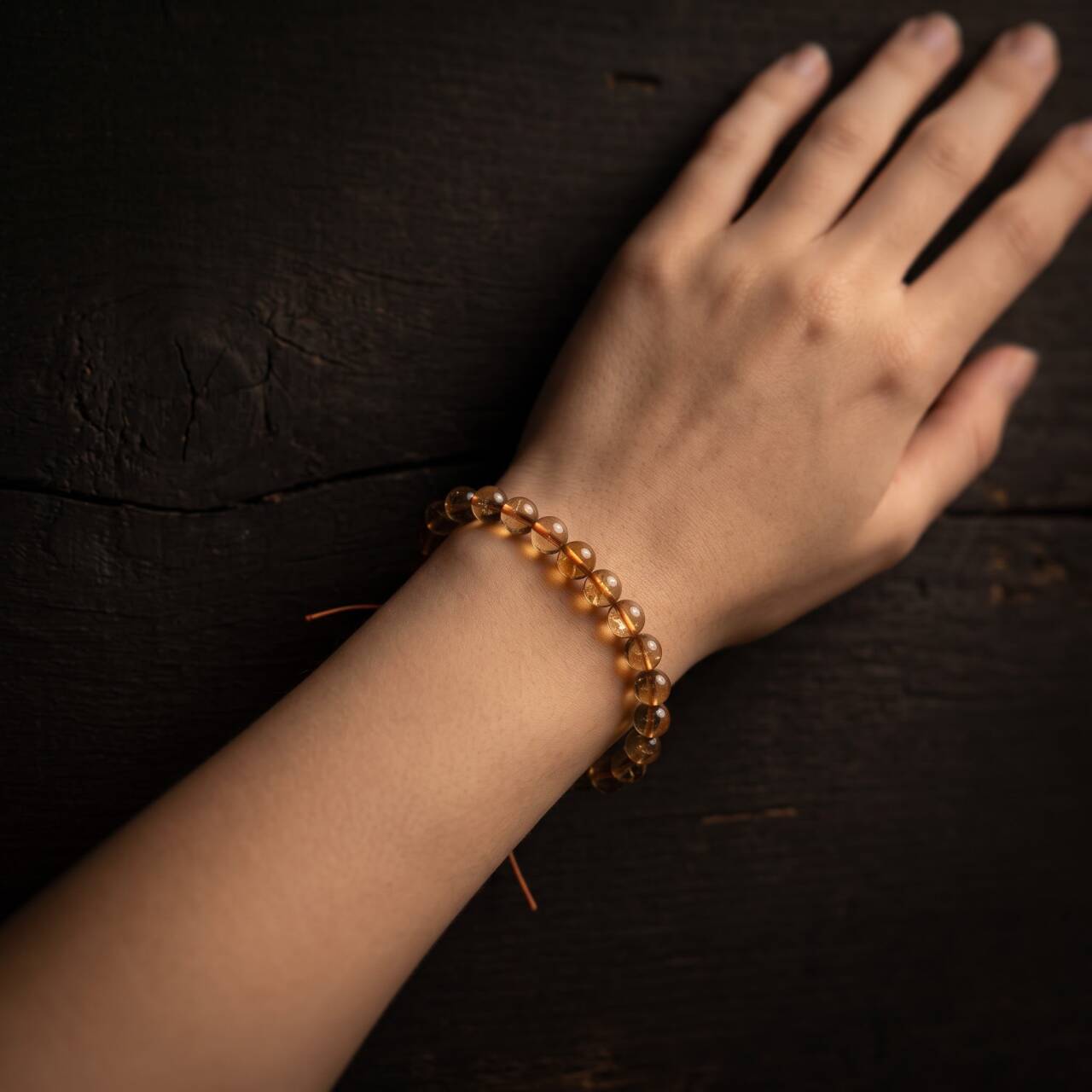 7mm citrine bracelet shown on the wrist