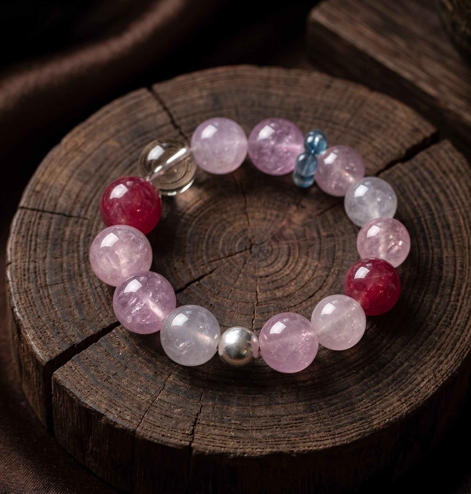 10mm clear-toned crystal and rose quartz bracelet in the main product view