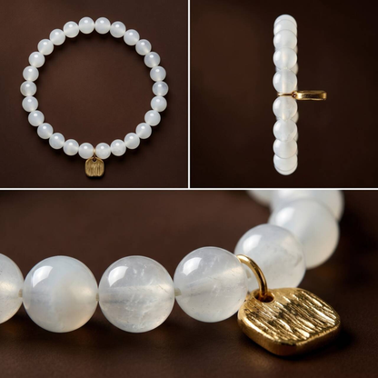 Close-up of creamy white 7mm Hetian jade beads showing natural translucency