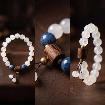 Creamy white Hetian jade bracelet held in hand in natural light