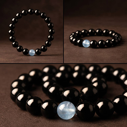 Deep black 10mm obsidian beads shown in a close-up view
