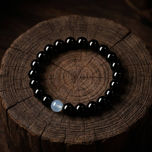 Main product view of a 10mm obsidian bead bracelet