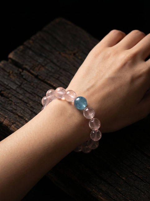 10mm Rose Quartz bracelet shown on the wrist