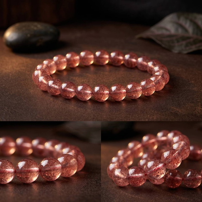 Close-up of 7mm Strawberry Quartz beads with pink-red tones and seed-like inclusions